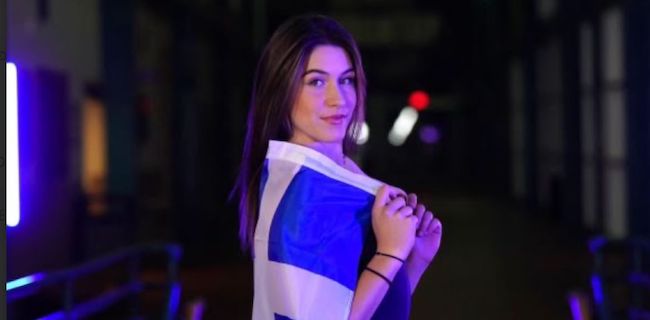 christina lazari with greek flag