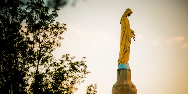 ns grotto with mary at dusk