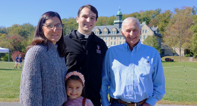 Seminarian with family at family weekend